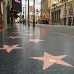 Hollywood Walk of Fame stars on sidewalk