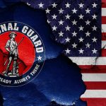 National Guard logo over a distressed American flag