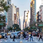 City street with pedestrian crossing and traffic