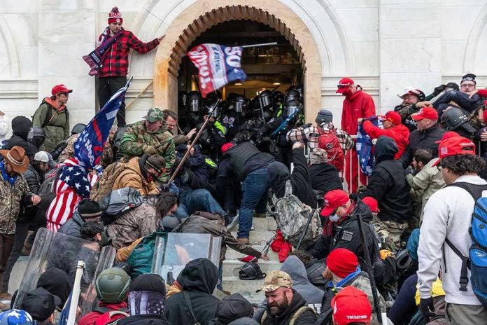 1889190778 Crowd storming a building entrance with flags and signs