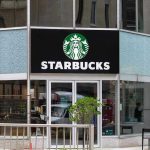 Starbucks storefront with glass doors and logo