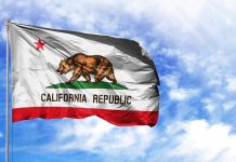 Democrats’ California Meltdown — GOP Eyes Historic Upset California Republic flag waving against blue sky.