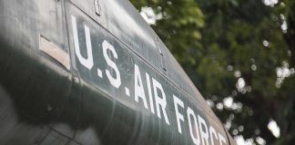 Shot Down AGAIN – Remarkable Survival & Rescue U.S. Air Force plane with trees in background.