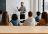 Teacher presenting to students in a classroom