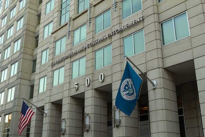 shutterstock_1485768215 U.S. government building facade with American and blue departmental flags