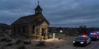 Shocking Claim: Macron Dragged Into Kirk Saga Police and forensic team at a crime scene near an abandoned church in the desert