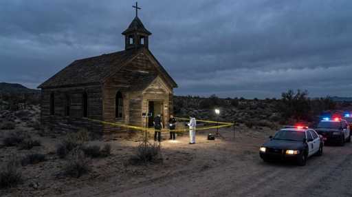 shutterstock_2755175385 Police and forensic team at a crime scene near an abandoned church in the desert