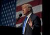 Supreme Shock: Trump Plan Gutted man in suit speaking at a podium with a US flag backdrop