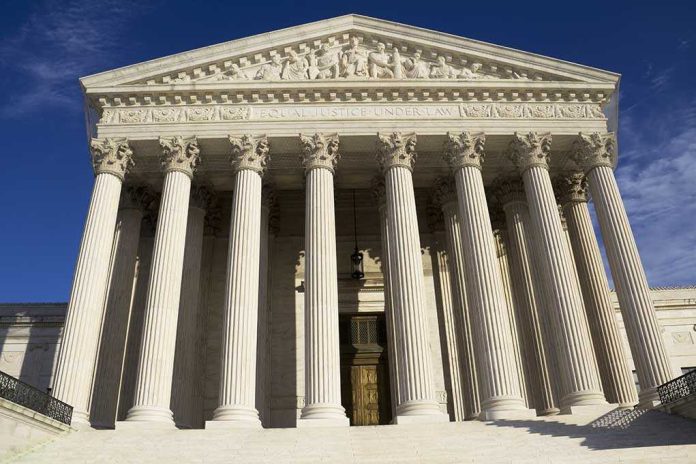 shutterstock_103670531 Facade of the Supreme Court building featuring tall columns and intricate carvings