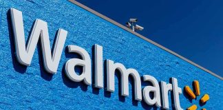 Budget Squeeze Exposed At Walmart Walmart storefront sign on bright blue exterior wall