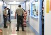 DHS Bets On Pain — Where’s The Data? Corrections officers escort an inmate in a jail hallway