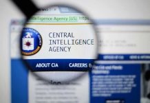 Outrage Erupts Over MI5 Internship Ban Magnifying glass highlighting CIA website header
