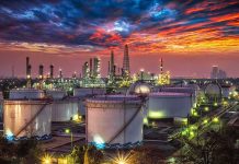 Deep Strikes Hammer Russia’s Oil Heart Oil refinery with storage tanks at sunset