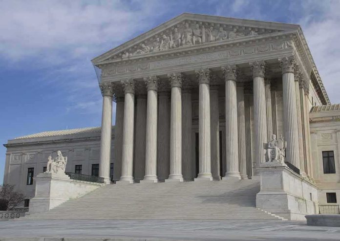 shutterstock_92660524 Supreme Court building with grand columns and steps