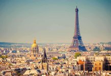 Eiffel Tower Scandal: Women Told To Hide A panoramic view of Paris featuring the Eiffel Tower and a golden dome
