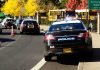 Bladed Pole Advance — Fatal LAPD Response Police cars with flashing lights near school buses on a city street