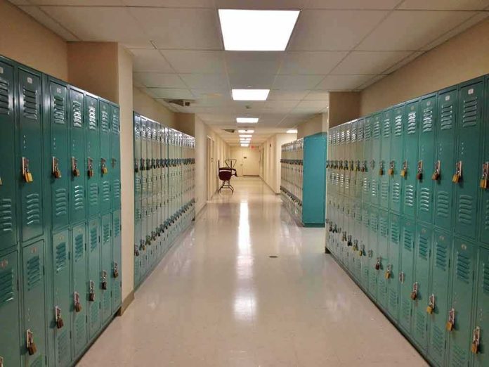 shutterstock_121588291 School hallway with rows of teal lockers