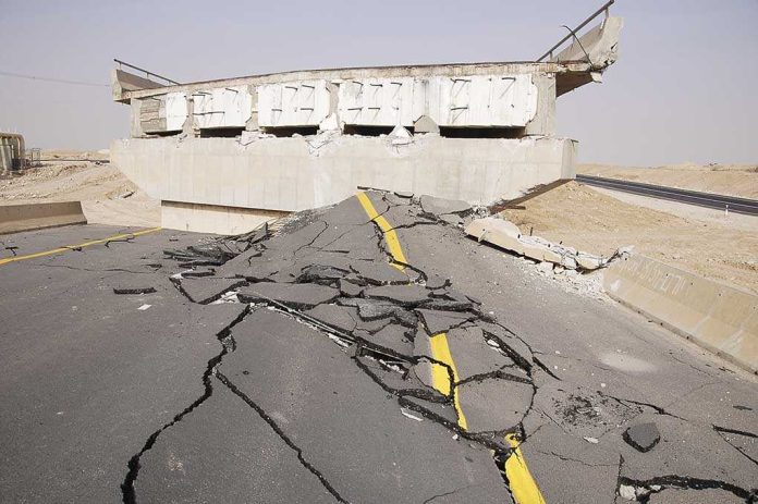 shutterstock_139550177 Severely damaged road and collapsed bridge due to earthquake