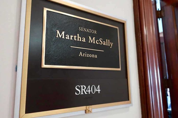 Office door plaque with senator name and room number