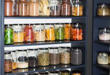 Dead Mouse Claim Triggers Rapid Recall Glass jars filled with dried foods on pantry shelves