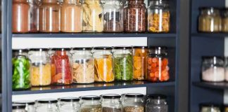 Dead Mouse Claim Triggers Rapid Recall Glass jars filled with dried foods on pantry shelves