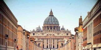 Paris Sees One Of Its Largest Religious Gatherings St. Peter's Basilica viewed from a busy street with crowds