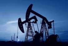 Cuba’s Energy Catastrophe: NO FUEL Left! Oil pumpjacks silhouetted against a twilight sky