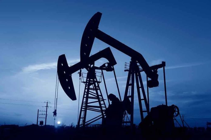 shutterstock_1672890445 Oil pumpjacks silhouetted against a twilight sky