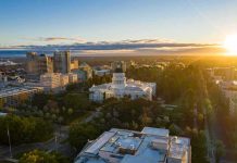 California State Capitol building at sunrise with surrounding downtown skyline