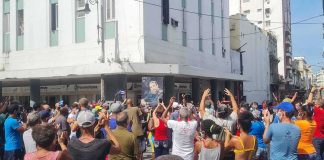 Energy Chokehold Pushes Cuba to the Brink Fidel Castro and Chuck Howley at a crowded street gathering