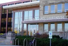 County Equity Plan Targets Beer Gardens Waukesha County Courthouse entrance with glass facade and signage