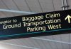 Airport directional sign for baggage claim and transportation