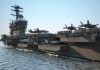 Carrier Hell: 10 Months, Grim Fallout Aircraft carrier at sea with fighter jets on deck