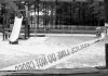 Queens Park Panic—Shooter Still Loose Playground closed off with caution tape in black and white