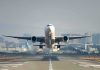 An airplane taking off from an airport runway