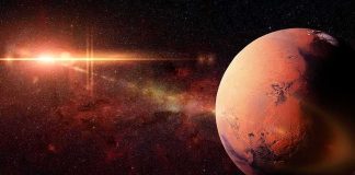 Astronomers Stunned by Planetary Infant Mars planet with sun flare in deep space