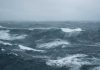 Rough ocean waves under a cloudy sky