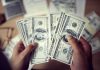 Money Changed After 2008 In A Surprising Way Hands counting US hundred-dollar bills