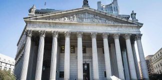 Tax Deadbeat No. 1 Lives Large In California Reporters and photographers gathered outside a neoclassical courthouse