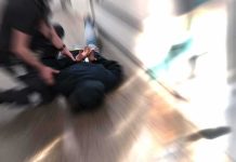 She Was About to Fly to China When FBI Moved In person being restrained on the ground in a hallway