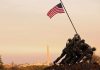 Vandal Targets Iwo Jima – Caught Mid-Swing Iwo Jima Memorial with soldiers raising the American flag at sunset