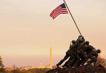 Vandal Targets Iwo Jima – Caught Mid-Swing Iwo Jima Memorial with soldiers raising the American flag at sunset