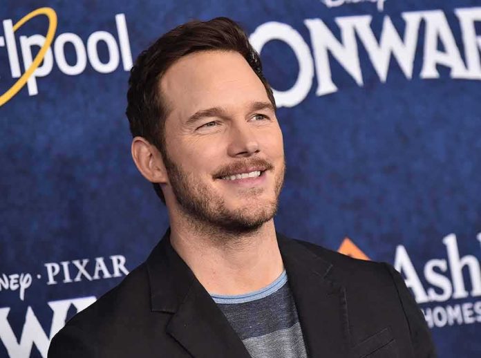 Chris Pratt smiles at a movie premiere event