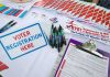 Chain-Of-Custody FAIL Exposes Glaring Blind Spot Voter registration table with forms, pens, and informational materials
