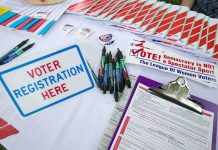 Chain-Of-Custody FAIL Exposes Glaring Blind Spot Voter registration table with forms, pens, and informational materials