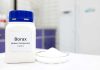 Salmonella Hit Confirmed – Identity Withheld borax container with blue cap beside dish of white powder in lab