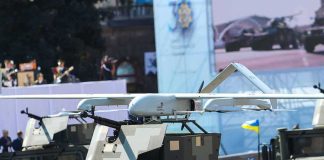 Footage Shows Soldier Airlifted By Hexacopter Military drone mounted on armored vehicle