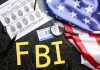 FBI Data Heist Twist – Suspect Starts Talking FBI letters with fingerprint sheet, badge, magnifying glass, and US flag