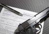 Bulletproof Talk Triggers Federal Takedown Handgun on firearm transaction form with pen