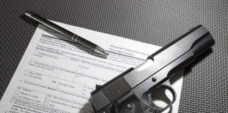 Bulletproof Talk Triggers Federal Takedown Handgun on firearm transaction form with pen